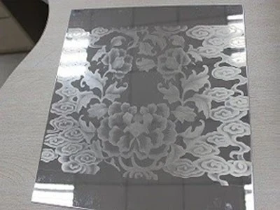 Laser marking patterns on mirror